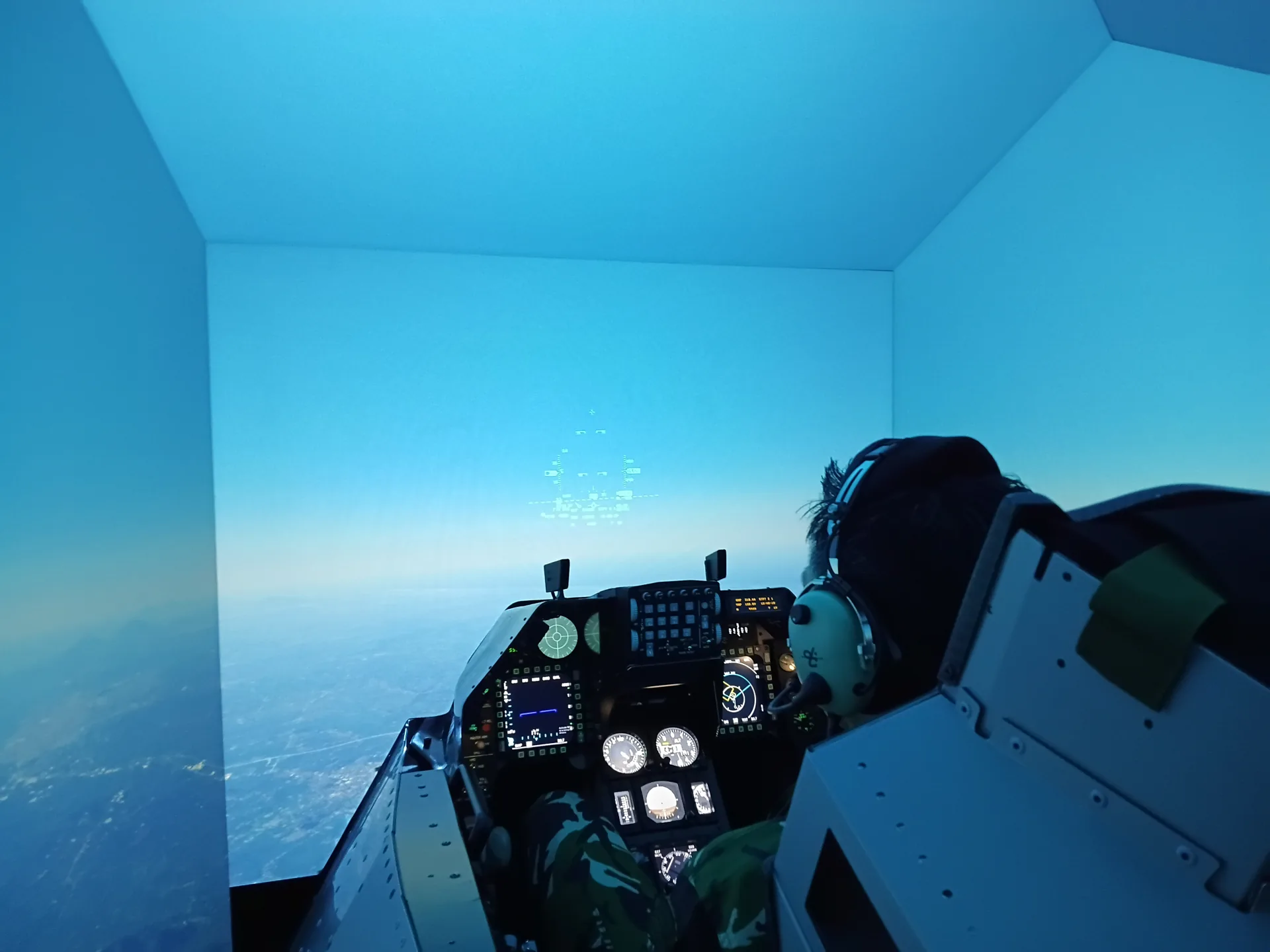 Replica F-16 cockpit inside a projection dome